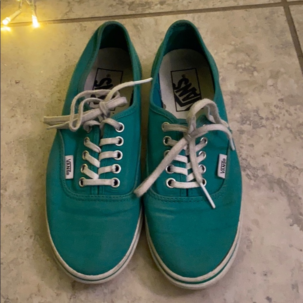 Women’s teal Vans sneakers